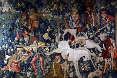 New York Cloisters 57 017 Unicorn Tapestries - The Unicorn Defends Itself - the injured unicorn is held at bay by 3 hunters ready to pierce him with their lances.jpg